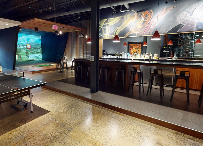 Golfzon simulator setup inside a bar or restaurant for design ideas