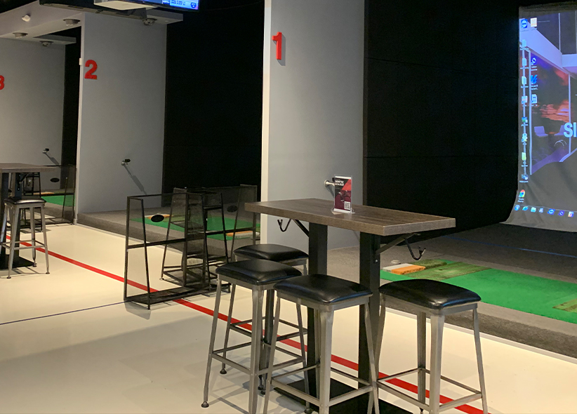 Golfzon simulator setup inside a bar or restaurant for design ideas