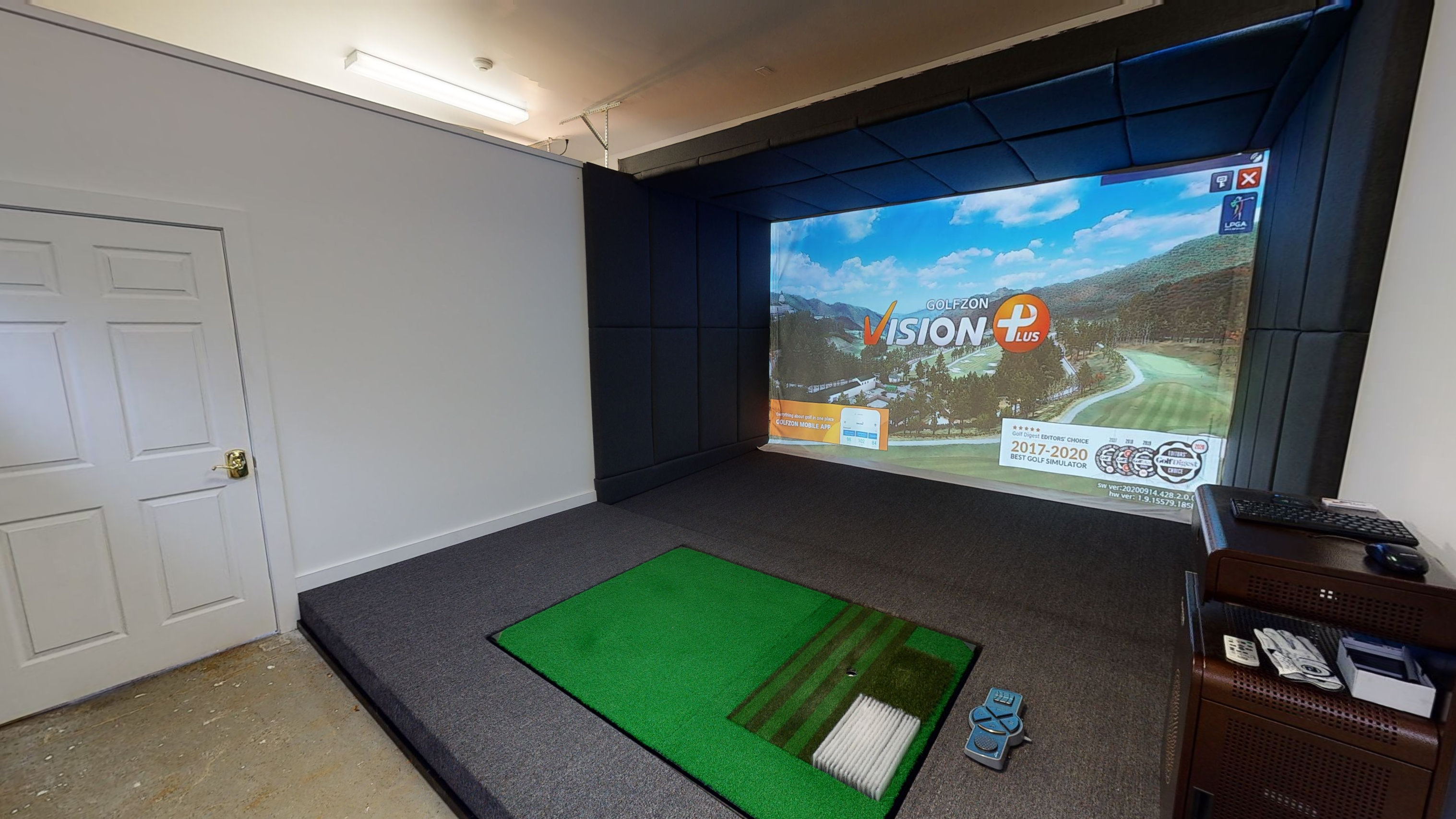 Golfzon simulator setup inside a home room for design ideas