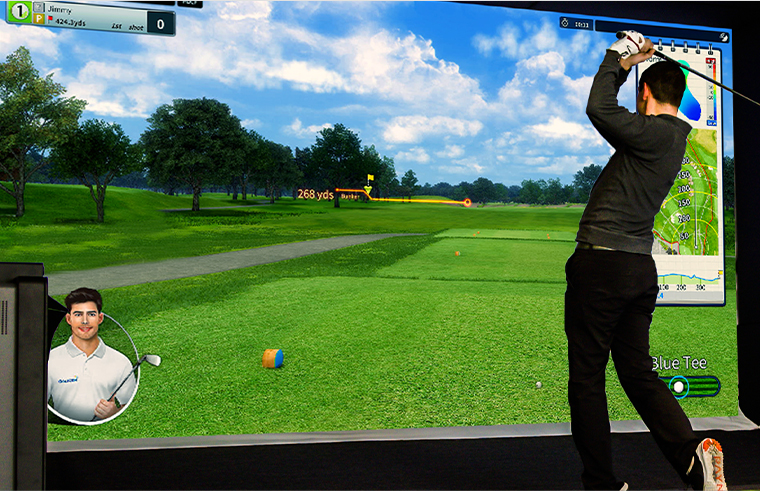A man in front of a big screen playing golf by Golfzon